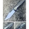 WE KNIFE BLACK AND GOLD HANDLE STONEWASH KNIFE- 616L